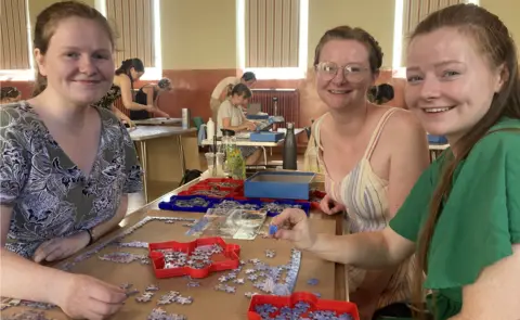 Jenny Kirk/BBC Sisters, from left to right, Alex Lloyd, Charlie Armstrong and Kate Armstrong