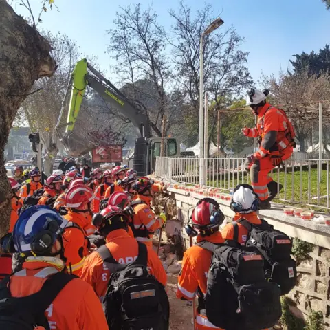 SFRS Steven Adams is pictured leading the rescue effort