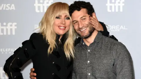 Getty Images Lady Gaga and Chris Moukarbel