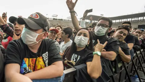 Getty Images Music fans at the Vive Latino music festival in Mexico in March