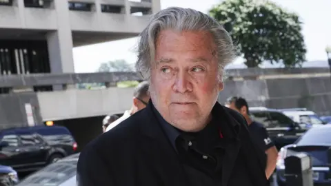 Getty Images Image shows Steve Bannon arriving at court