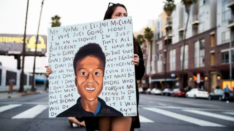 Getty Images A vigil was held demanding justice for Elijah McClain on the one year anniversary of his death