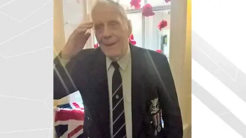 Family Handout John Smith wearing his medals