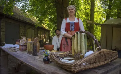 Tom Cawley re-enactors making candles