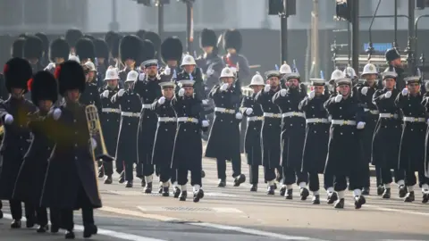 PA Media Members of the Royal Navy march down Whitehall ahead of the Remembrance Sunday service