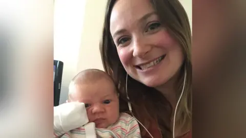 Cassandra Bodington Mother holding baby