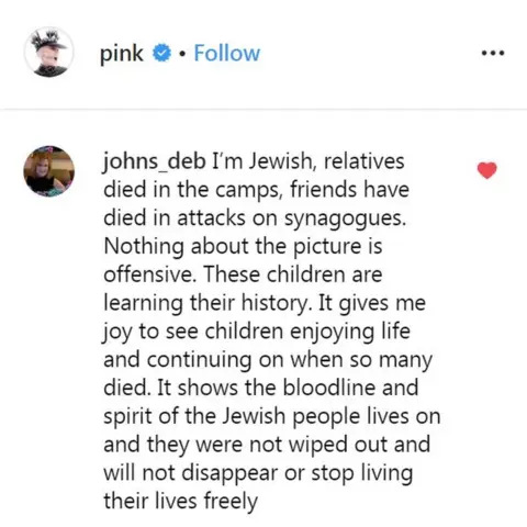 Johns_deb/Instagram A post from Instagram. It reads: "I'm Jewish, relatives died in the camps, friends have died in attacks on synagogues. Nothing about the picture is offensive. These children are learning their history. It gives me joy to see children enjoying life and continuing on when so many died. It shows the bloodline and spirit of the Jewish people lives on and they were not wiped out and will not disappear or stop living their lives freely."