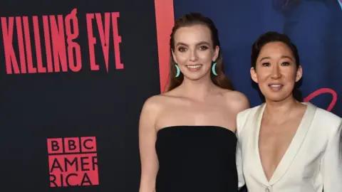 Getty Images Jodie Comer and Sandra Oh