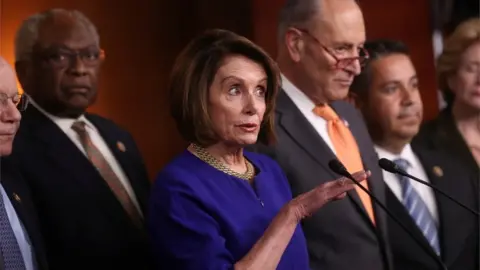 Reuters Speaker of the House Nancy Pelosi (D-CA) and Senate Democratic Leader Chuck Schumer (D-NY) speak to the media with House Majority Whip Jim Clyburn (D-SC) and Assistant House Speaker Ben Ray Lujan (D-NM) at their sides after returning to the U.S. Capitol from a meeting with U.S. President Donald Trump at the White House in Washington, U.S., May 22, 2019. REUTERS/Jonathan Ernst