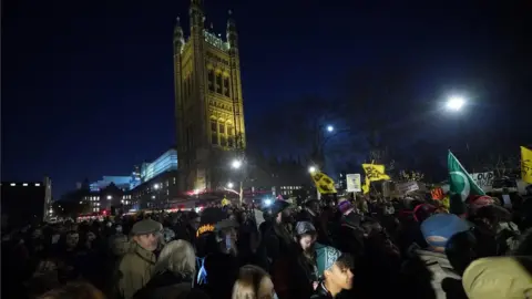 PA Media Demonstrators take part in a "Kill The Bill" protest against The Police, Crime, Sentencing and Courts Bill, on College Green, Westminster, as the bill is considered in the House of Lords.