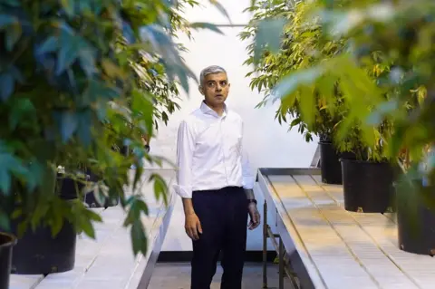 PA Media Sadiq Khan at a cannabis farm