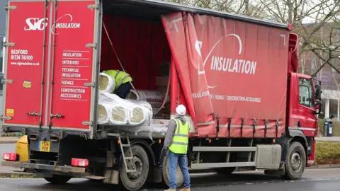 South Beds News Agency Construction materials on lorry