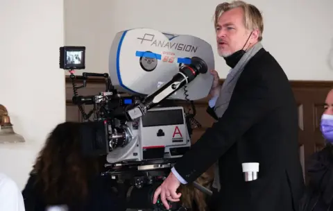 Universal Pictures Christopher Nolan on the set of Oppenheimer, was hailed as 'a genius' by Cillian Murphy