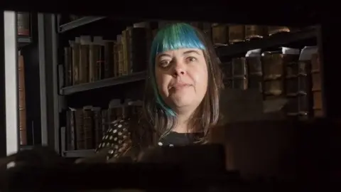 Sarah in the special collection library