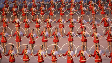 Getty Images North Koreans perform gymnastic and artistic during a South Korean President Moon Jae-in and North Korean leader Kim Jong Un visit at the May Day Stadium on September 19, 2018 in Pyongyang