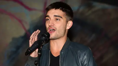 Getty Images Tom Parker pictured in 2013