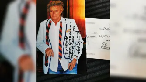 Natasha Jenkins Rod Stewart and cheque