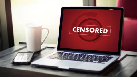 Getty Images Censored logo on laptop screen