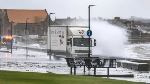 Weatherwatcher Dreww248 Lorry getting battered by waves in Troon