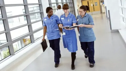 Science Photo Library nurses in hospital