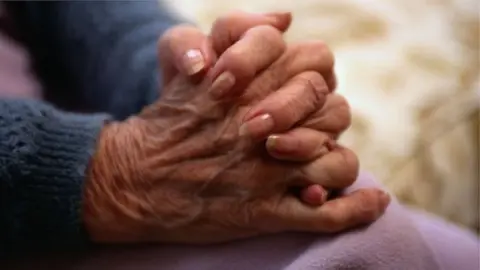 Thinkstock An older woman's hands