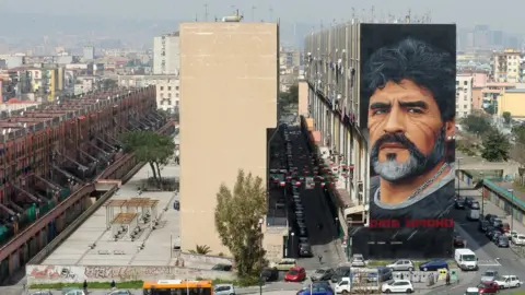 Getty Images Image shows a Diego Maradona mural in Naples