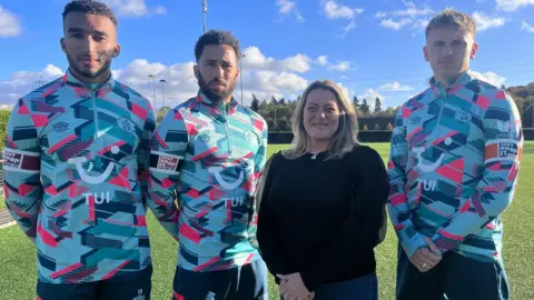 BBC/Nicola Haseler Jacob Murphy, Andros Townsend and Alfie Doughty with Roseann Taylor