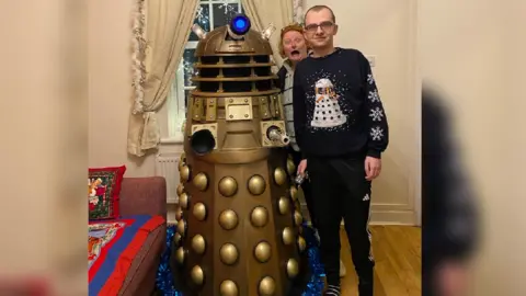 Tom Herbert/Angela Jones Noah with a Dalek