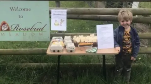 Clare family Harry at the shop