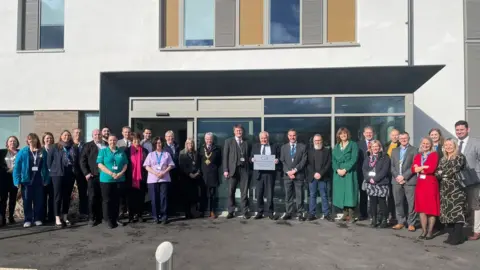 Bath and North East Somerset, Swindon and Wiltshir A group of people outside a health centre