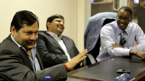Getty Images Ajay and Atul Gupta, and Duduzane Zuma