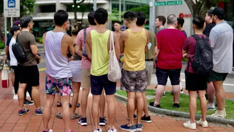 BBC/Tessa Wong Attendees of Isaac Tng's Singapore LGBT history tour