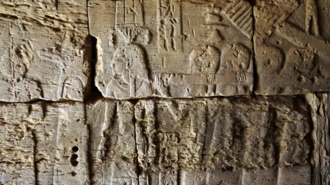 Getty Images A bas-relief in one of the pyramids at the Meroe archaeological site, about five km (three miles) east of the Nile.