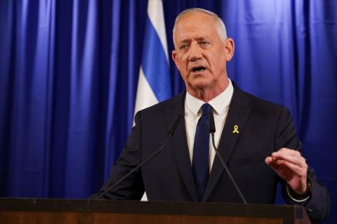 Israeli Minister Benny Gantz addresses the media after his ultimatum to withdraw his centrist party from Israeli Prime Minister Benjamin Netanyahu’s emergency government expired, in Ramat Gan,