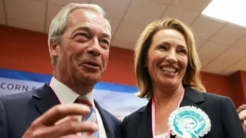 Nigel Farage and Sarah Pochin smiling together