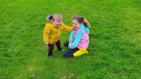 Jennifer Duddy Ryan and Chloe in the park