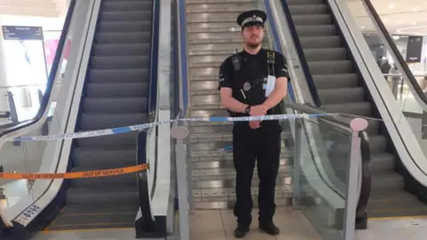 Essex Police A police officer at Lakeside shopping centre in Thurrock