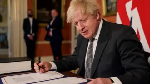 10 Downing Street Boris Johnson signing the trade deal