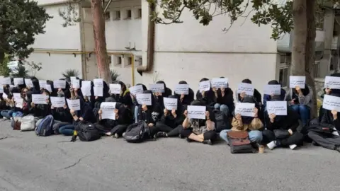 HRANA Photo posted by Iran's Human Rights Activists News Agency (HRANA) showing a sit-in strike by students at the women-only Al-Zahra University in Tehran