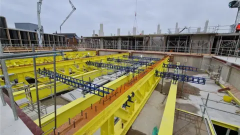 HOPKINS ARCHITECTS Concert hall in progress outside