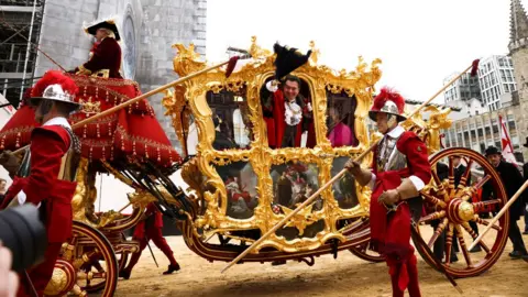 Reuters The new Lord Mayor of London, Vincent Keaveny, waves from his carriage during the Lord Mayor"s Show, in London