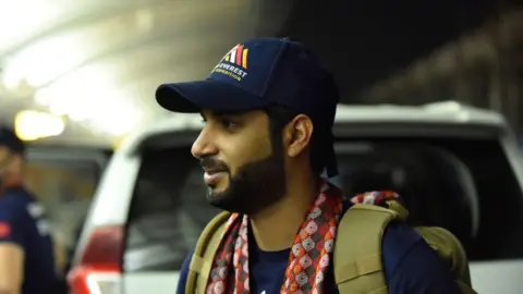 Getty Images Mohamed Hamad Mohamed al-Khalifa arriving in Nepal