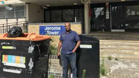 Rory Bennett Salah Hassanein stands outside the block