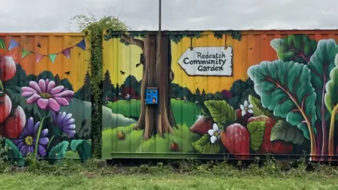 Redcatch Community Garden A vibrant mural on Redcatch Community Garden's fence