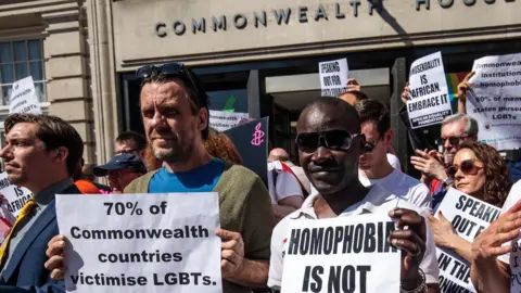 Getty Images Gay rights protesters outside Commonwealth House on 19 April 2018.