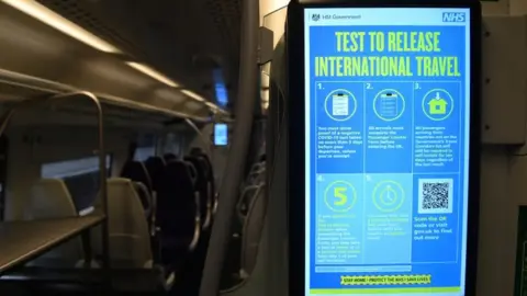 EPA All travellers arriving in the UK will need to show proof of a negative Covid-19 test