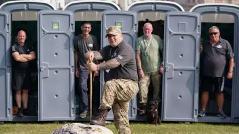 PA Media Forgotten Veterans UK founder Gary Weaving alongside veterans (from left to right) Ian Baillie, Mike Hewlett, Gary Sprakes and Chris Nicholls