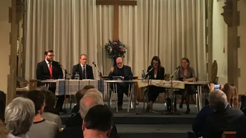 PA Media Foreign Secretary Dominic Raab (centre left) attends a hustings at East Molesey Methodist Church in his constituency in East Molesey. Also attending are Labour candidate, Peter Ashurst (far left), Liberal Democrat candidate Monica Harding (centre right) and independent candidate, Kylie Keens (far right).