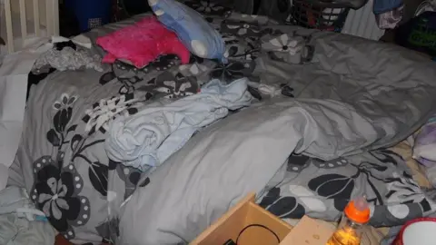 Cumbria County Council The double bed where Poppi Worthington was placed at the time of her collapse on December 12, 2012