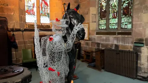 Church displays life-size soldier and war horse